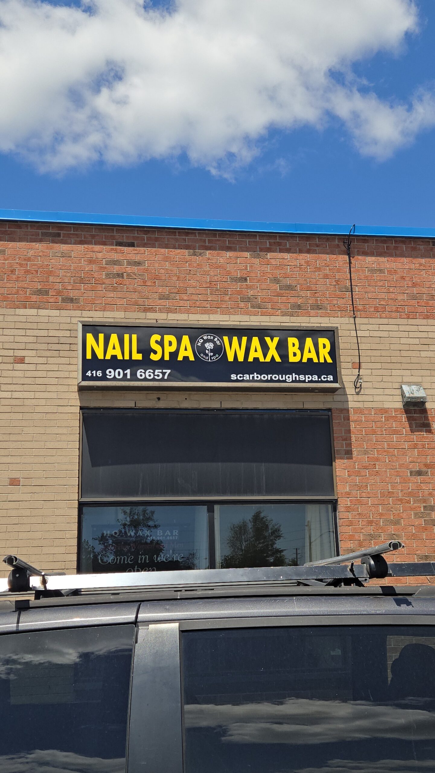 Nail Spa and Wax Bar storefront sign by Denton Design.