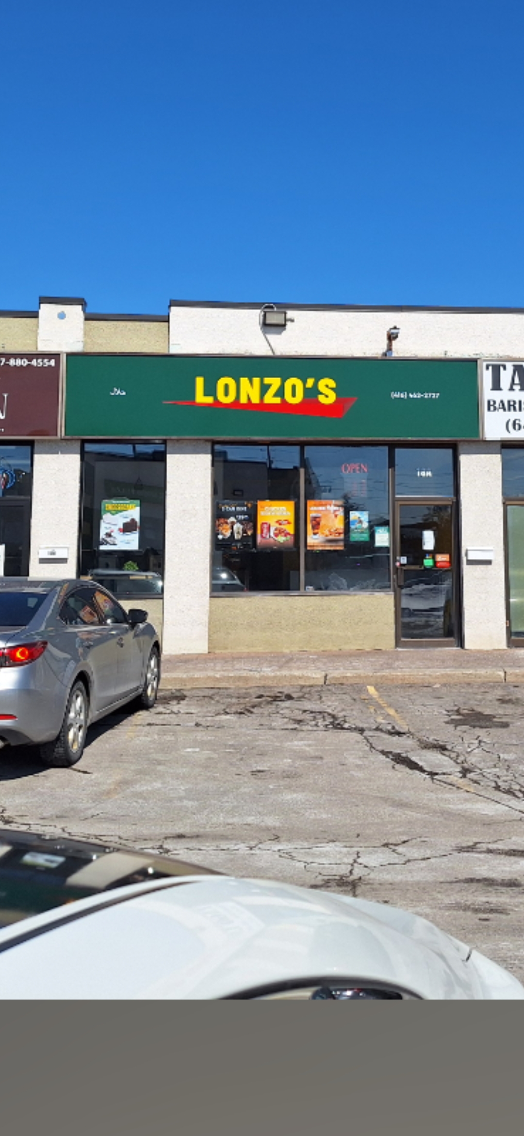 Lonzo's storefront sign project by Denton Design.