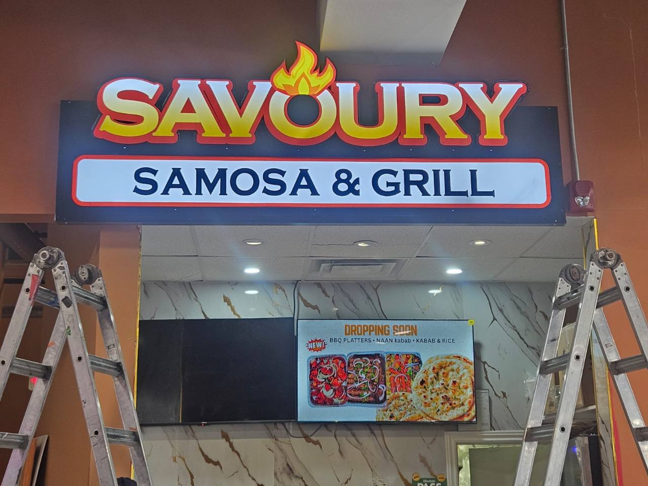 Savoury Samosa & Grill illuminated storefront sign completed by Denton Design.